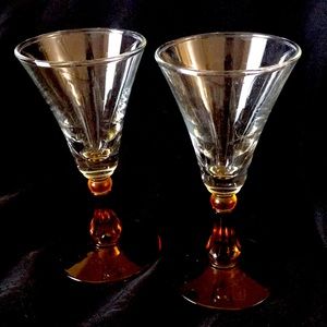 A pair of liquor stemmed two-tone glasses